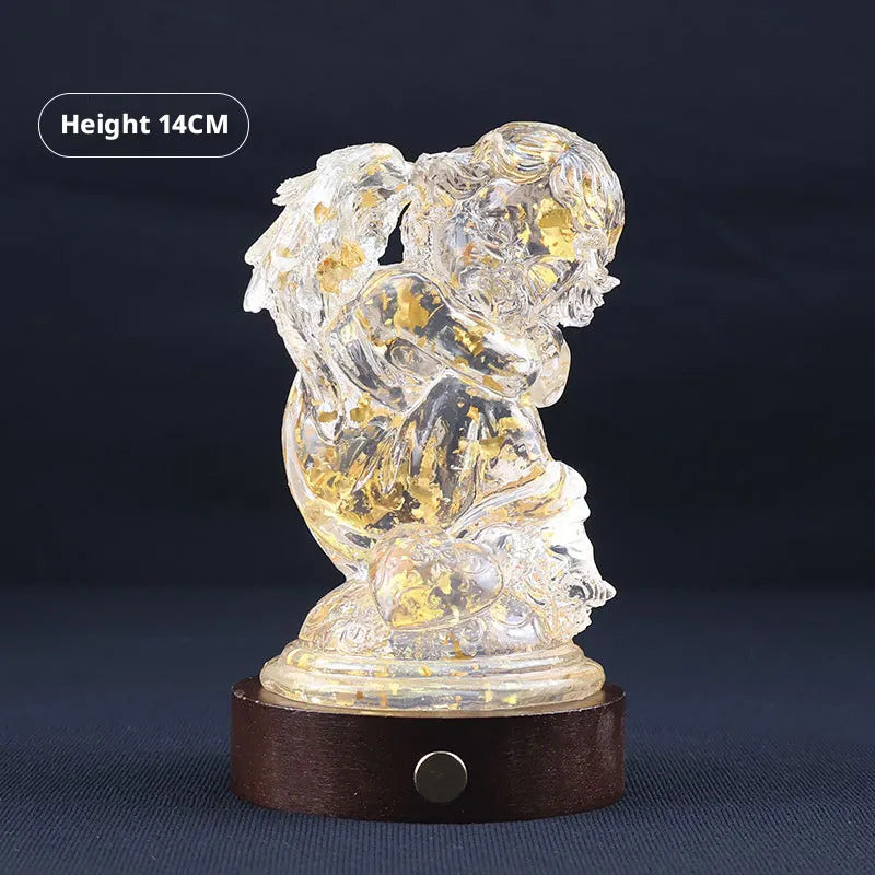 Transparent resin angel figurine, table lamp, adjustable lighting