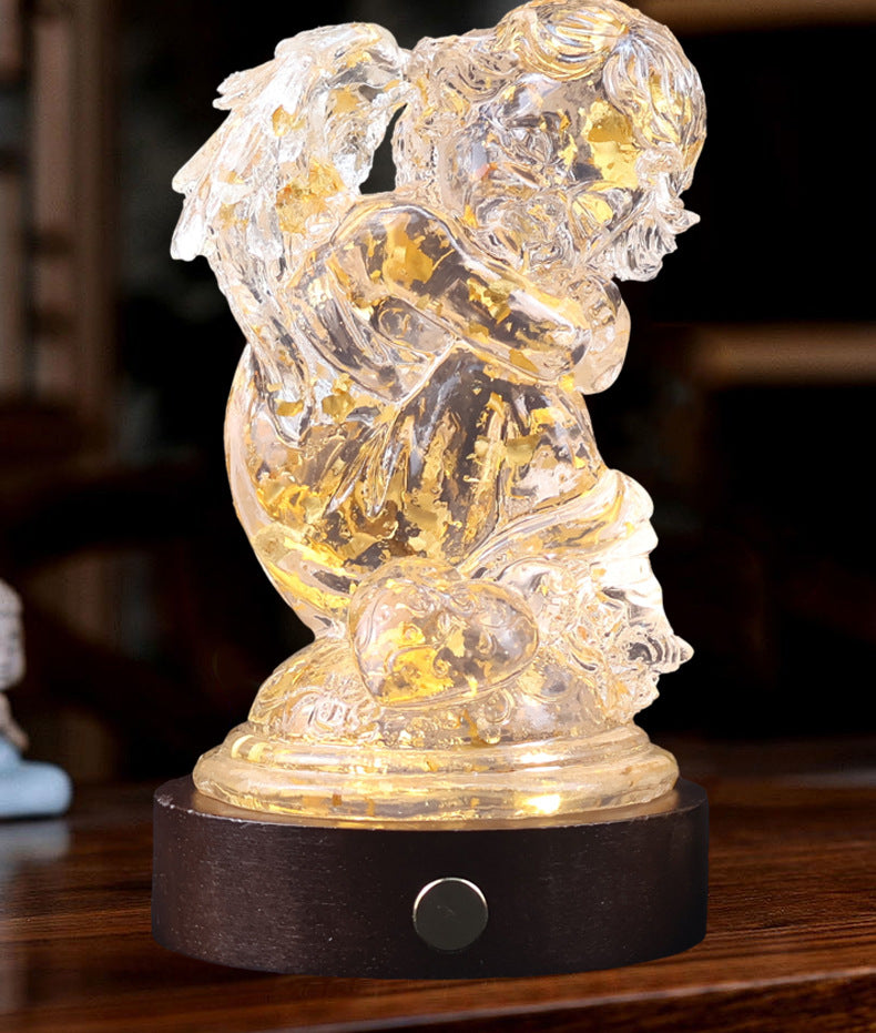 Transparent resin angel figurine, table lamp, adjustable lighting