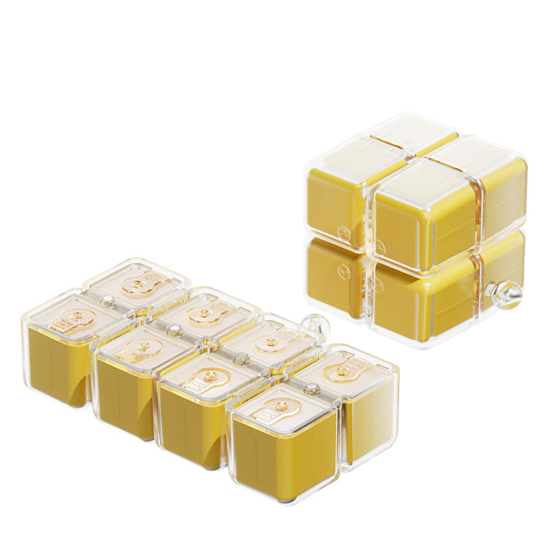 A portable medication organizer designed in the shape of a Rubik's Cube, featuring a lanyard for convenient carrying, a high-capacity dispensing compartment, and a sealed, moisture-resistant storage container organized for daily use across seven days.